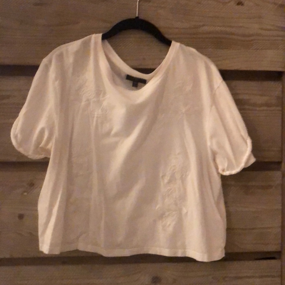 White shirt with embroidered flowers